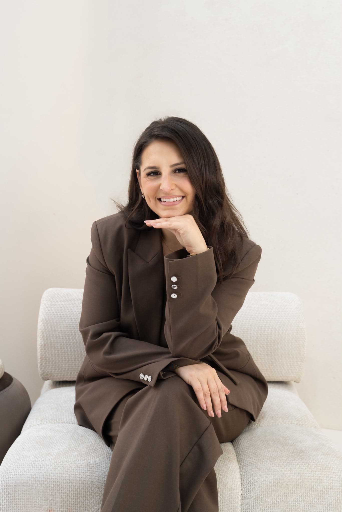 Dr Asena Bulbul smiling in the clinic